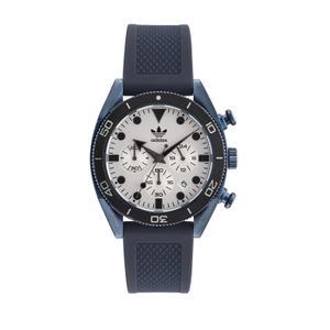 Reloj Cronógrafo de Adidas para Hombre de Acero Pavonado Azul con Correa de Silicona Azul. Esfera Blanca con Números Palos y Puntos. Bisel Deportivo Negro. Sumergible 100 metros. Caja de 43 mm. AOFH23004