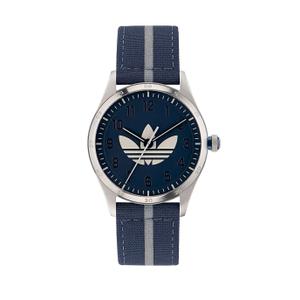 Reloj Adidas para Caballero con Caja de Acero y Correa de Tela Azul con Línea Gris en el Centro. Esfera Azul con Números Árabes y Palos con Logotipo Blanco en el Centro. Bisel Liso. Sumergible 50 metros. Caja de 42 mm AOSY23041