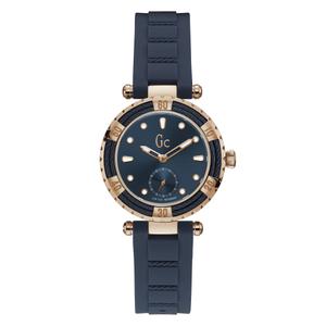 Reloj Guess Collection para Señora de Acero Pavonado Rosa con Correa Silicona Azul Calibre 16mm. Esfera Azul Números Palos y Puntos. Bisel con 2 Cables Azules y Números. Cristal Mineral Recubierto de Zafiro. Swiss Movement. Sumergible 100m. Caja de 34mm.  Y41006L7