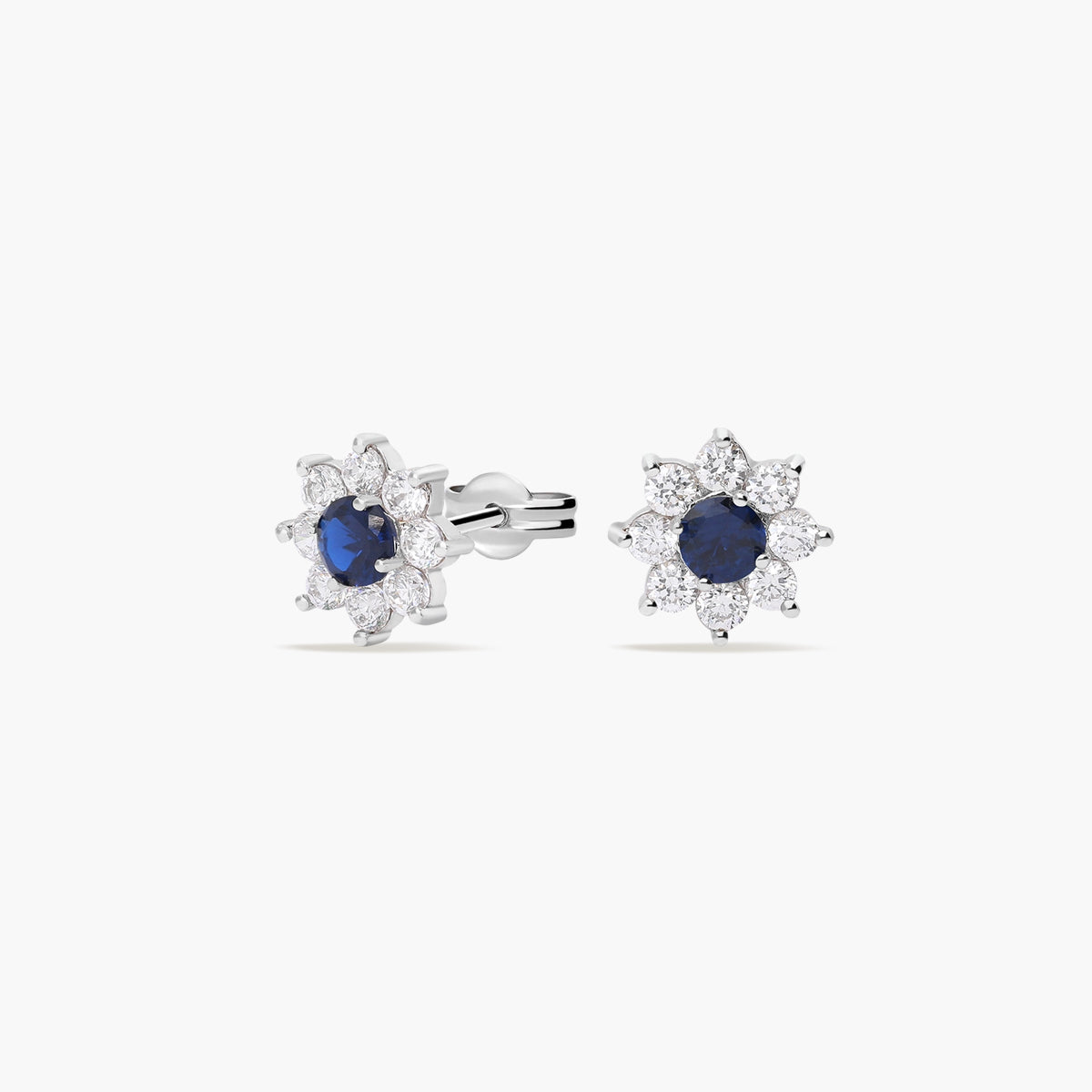 Pendientes flor de oro blanco 18k circonitas azul y blanco 11 mm