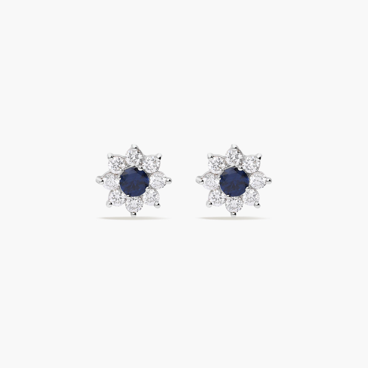 Pendientes flor de oro blanco 18k circonitas azul y blanco 11 mm