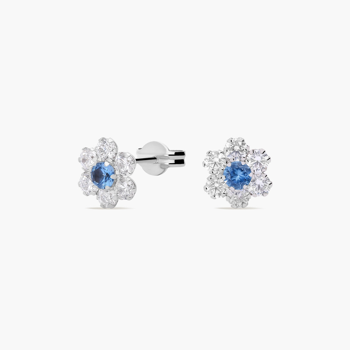 Pendientes flor de oro blanco 18k circonitas azul y blanco 7 mm