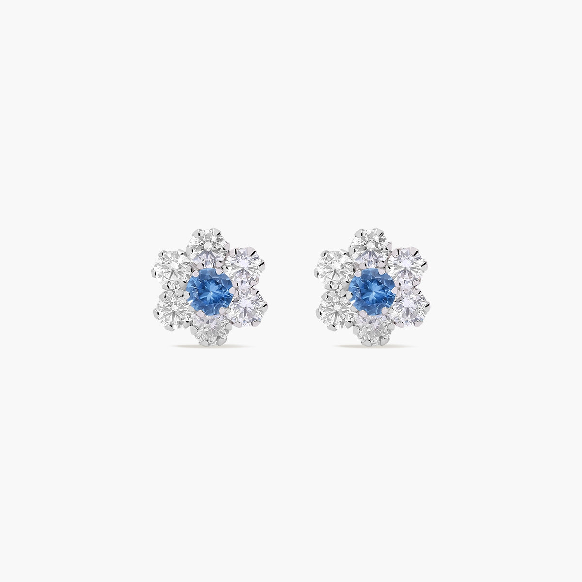 Pendientes flor de oro blanco 18k circonitas azul y blanco 7 mm