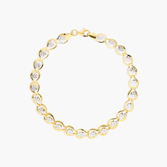 Pulsera de oro bicolor 18K eslabón oval flor 19 cm
