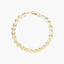 Pulsera de oro bicolor 18K eslabón oval flor 19 cm