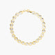 Pulsera de oro bicolor 18K eslabón oval flor 19 cm