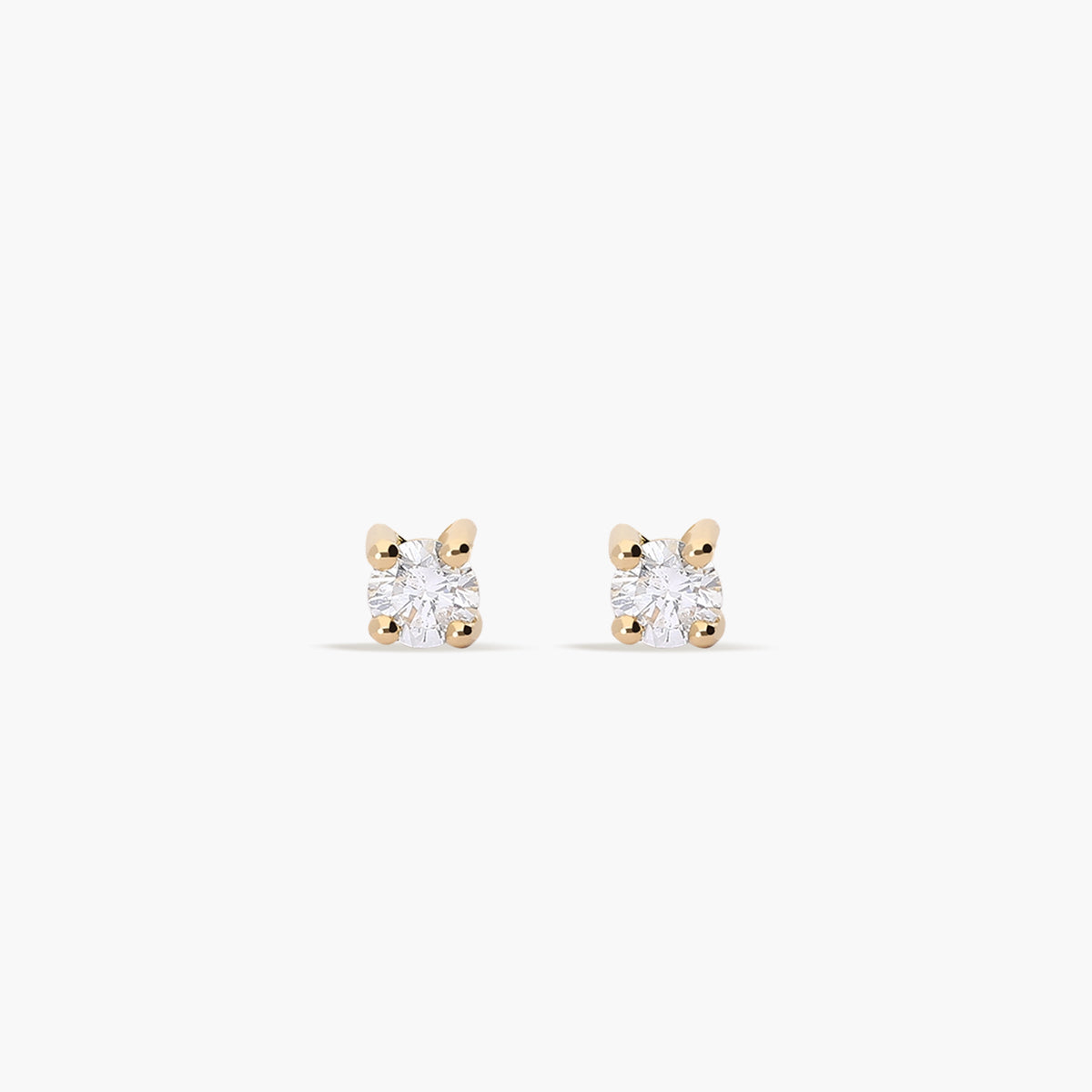 Pendientes redondos de oro 18K diamante natural 0.20 ct. 3 mm