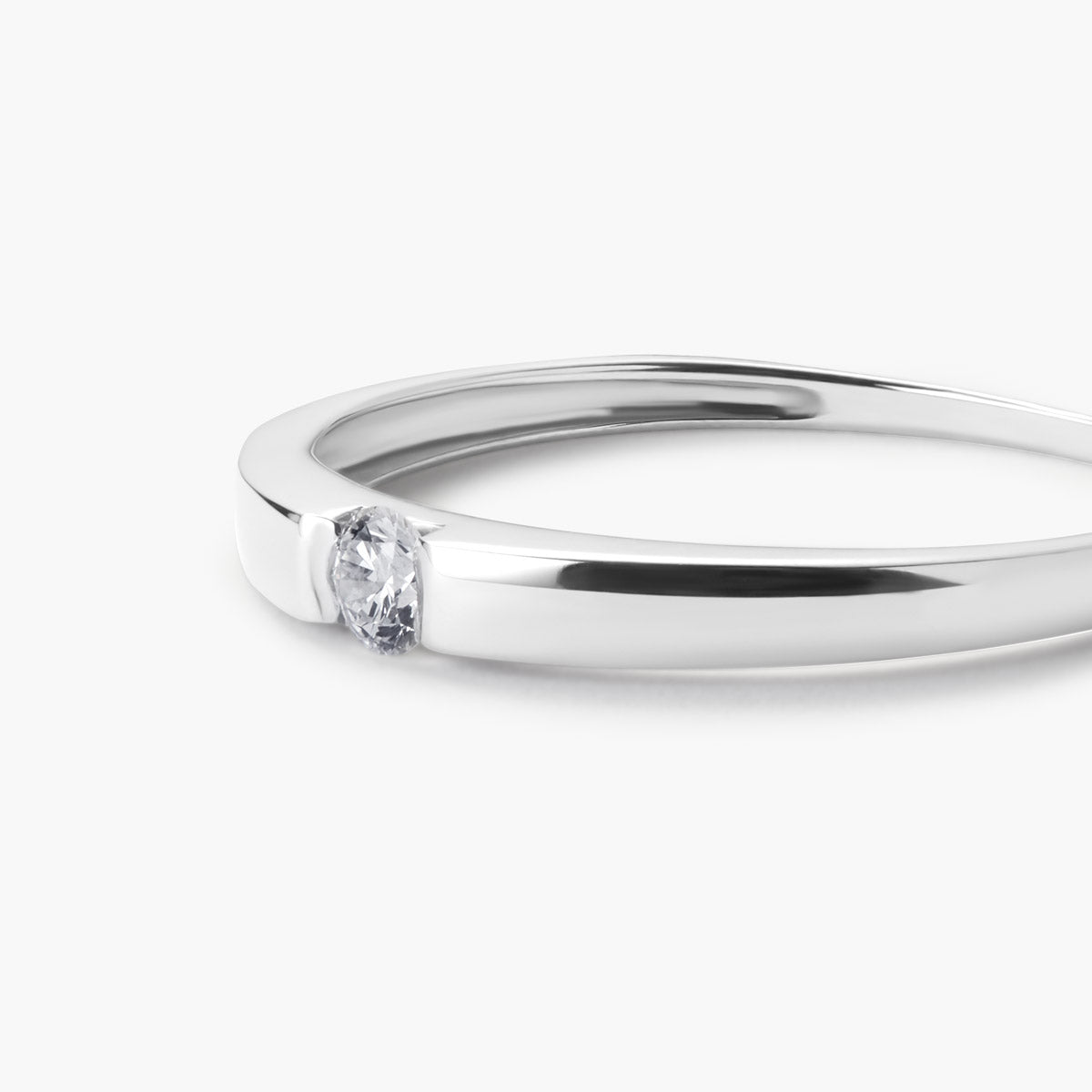 Anillo de oro blanco 18K diamante natural 0.1 ct.