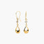 Pendientes largos de oro 18K circonita 25 mm