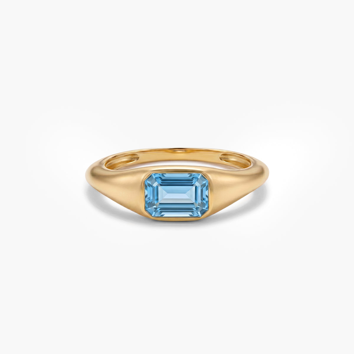 Anillo de plata 1ª ley con baño de oro 18K topacio azul BLOWN