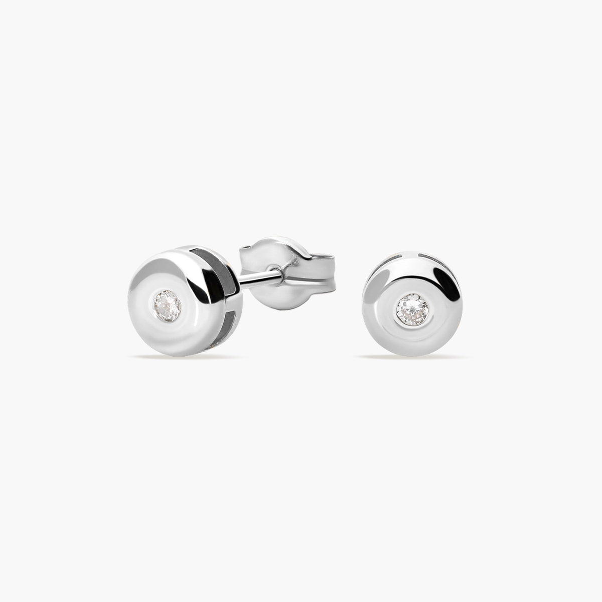 Pendientes redondos de oro blanco 18K diamante natural 0.05 ct. 4 mm