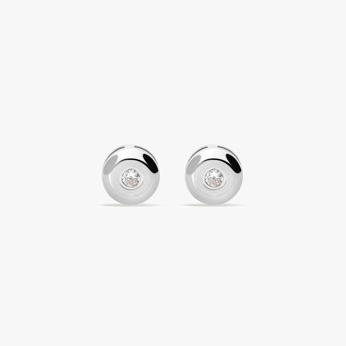 Pendientes redondos de oro blanco 18K diamante natural 0.05 ct. 4 mm