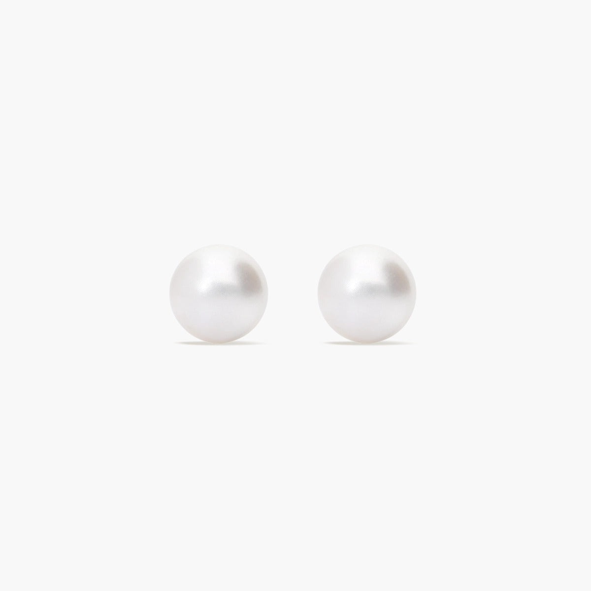 Pendientes de botón de oro blanco 18K con perlas 7 mm