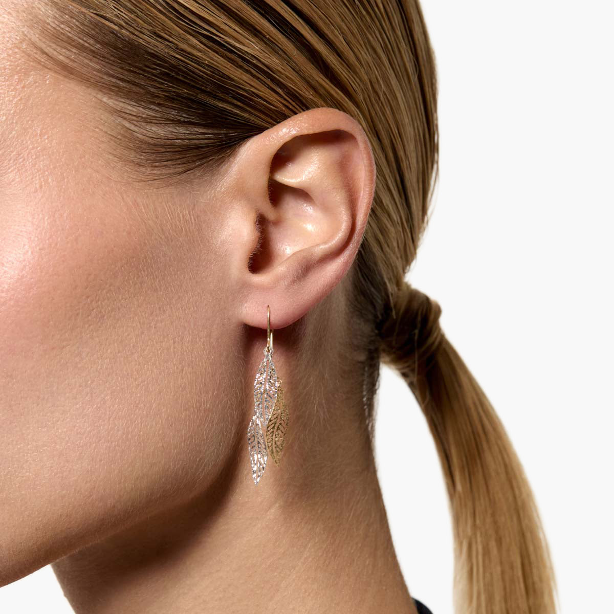 Pendientes largos hojas de oro bicolor 18K 48 mm