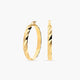 Pendientes de aro media caña rizado de oro 18K 35 mm