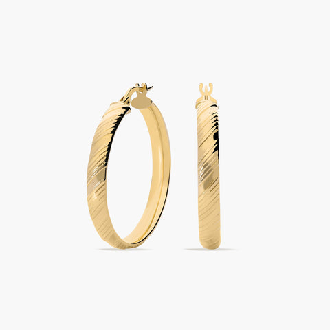 Pendientes de aro media caña rayado de oro 18K 30 mm
