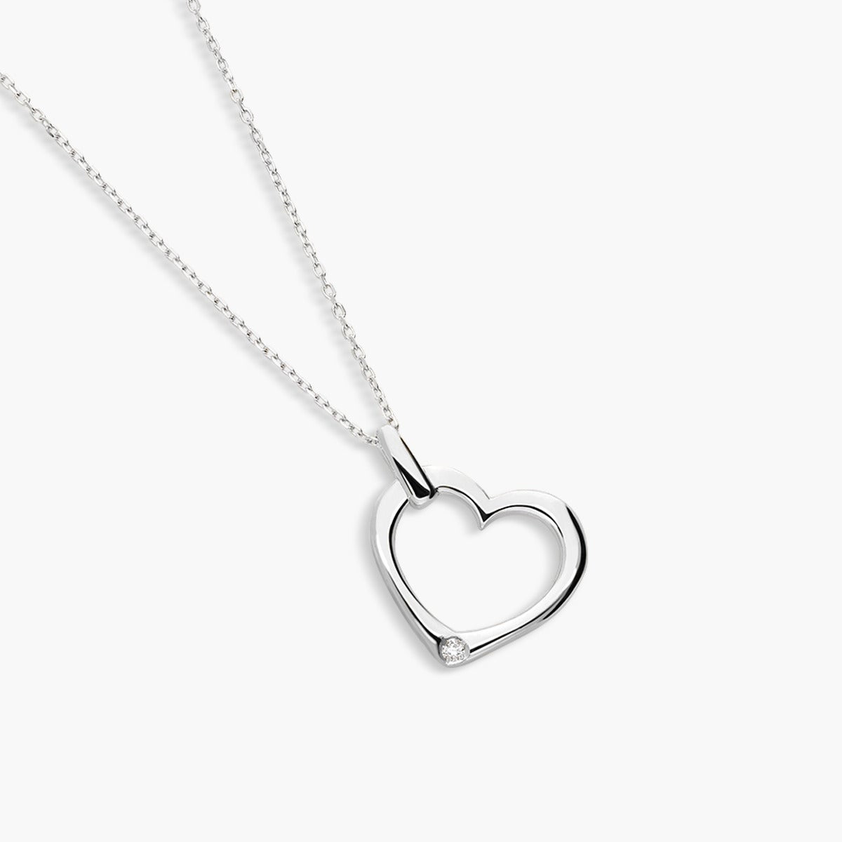 Collar silueta corazón de oro blanco 18K diamante natural 0.01 ct. 11 mm