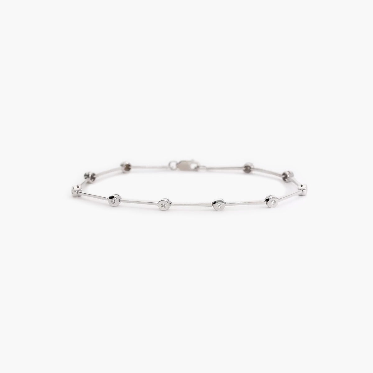 Pulsera de oro blanco 18K diamante natural 0.18 ct. 19 cm