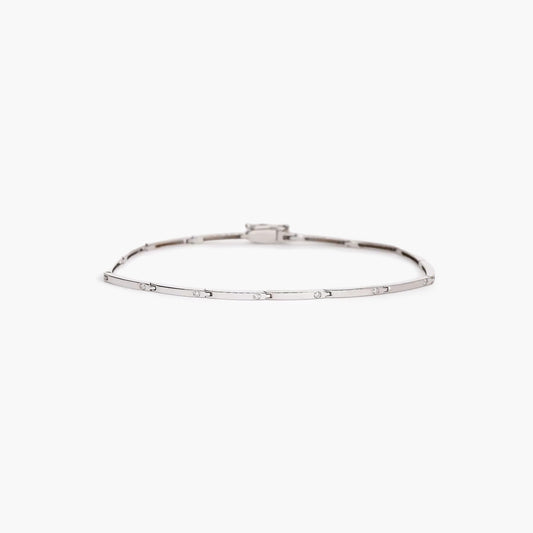Pulsera de oro blanco 18K diamante natural 0.14 ct. 18 cm
