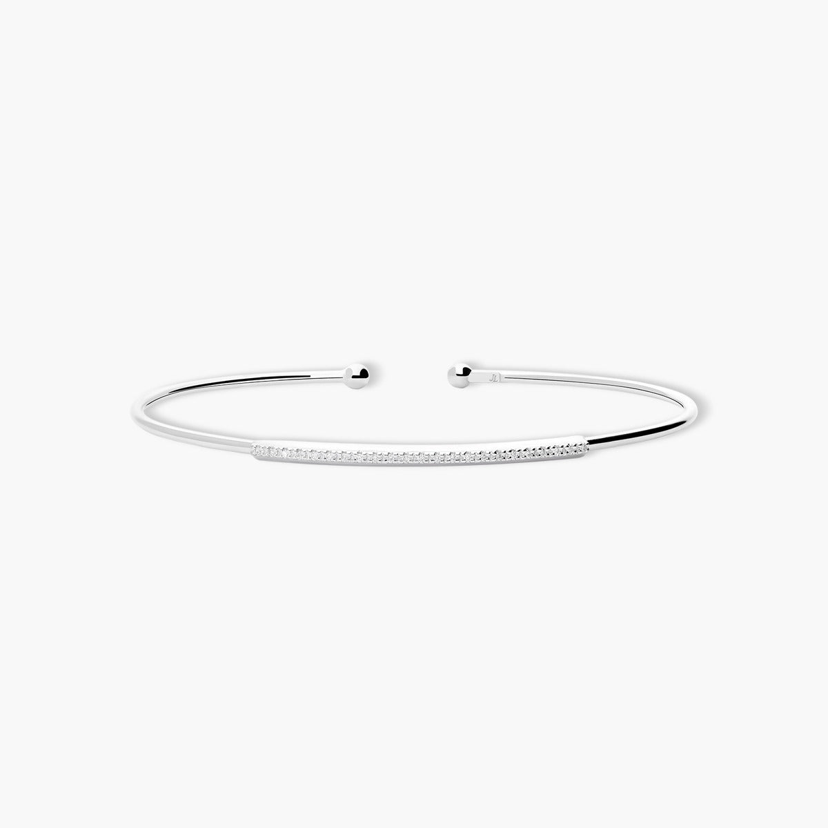 Pulsera rígida redonda de oro blanco 18K diamante natural 0.12 ct. 62x48 mm