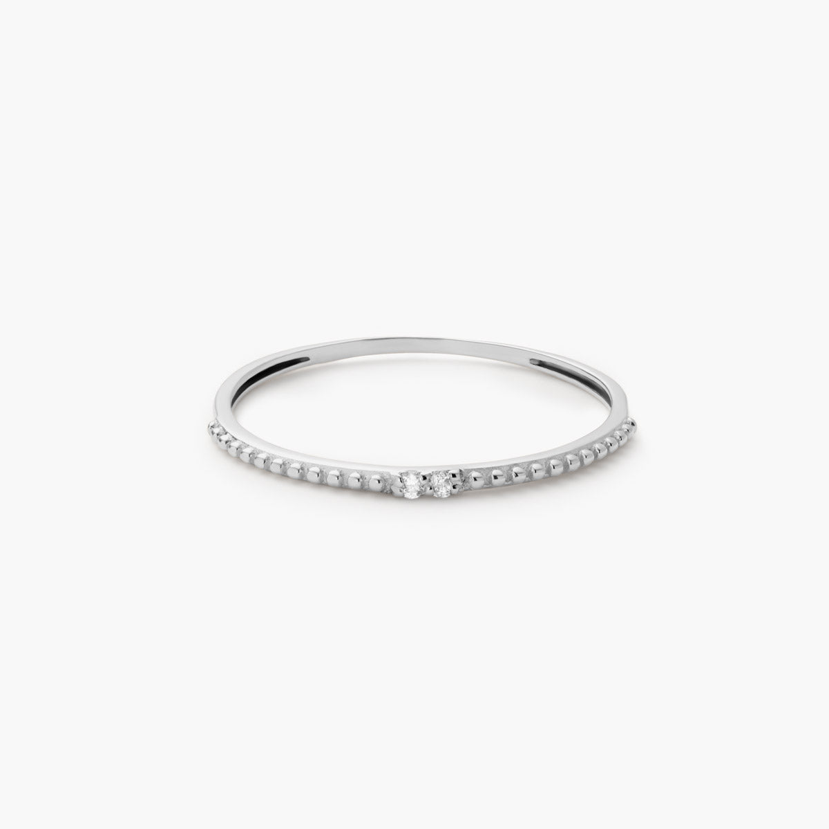 Anillo de oro blanco 18K diamante natural 0.016 ct. 