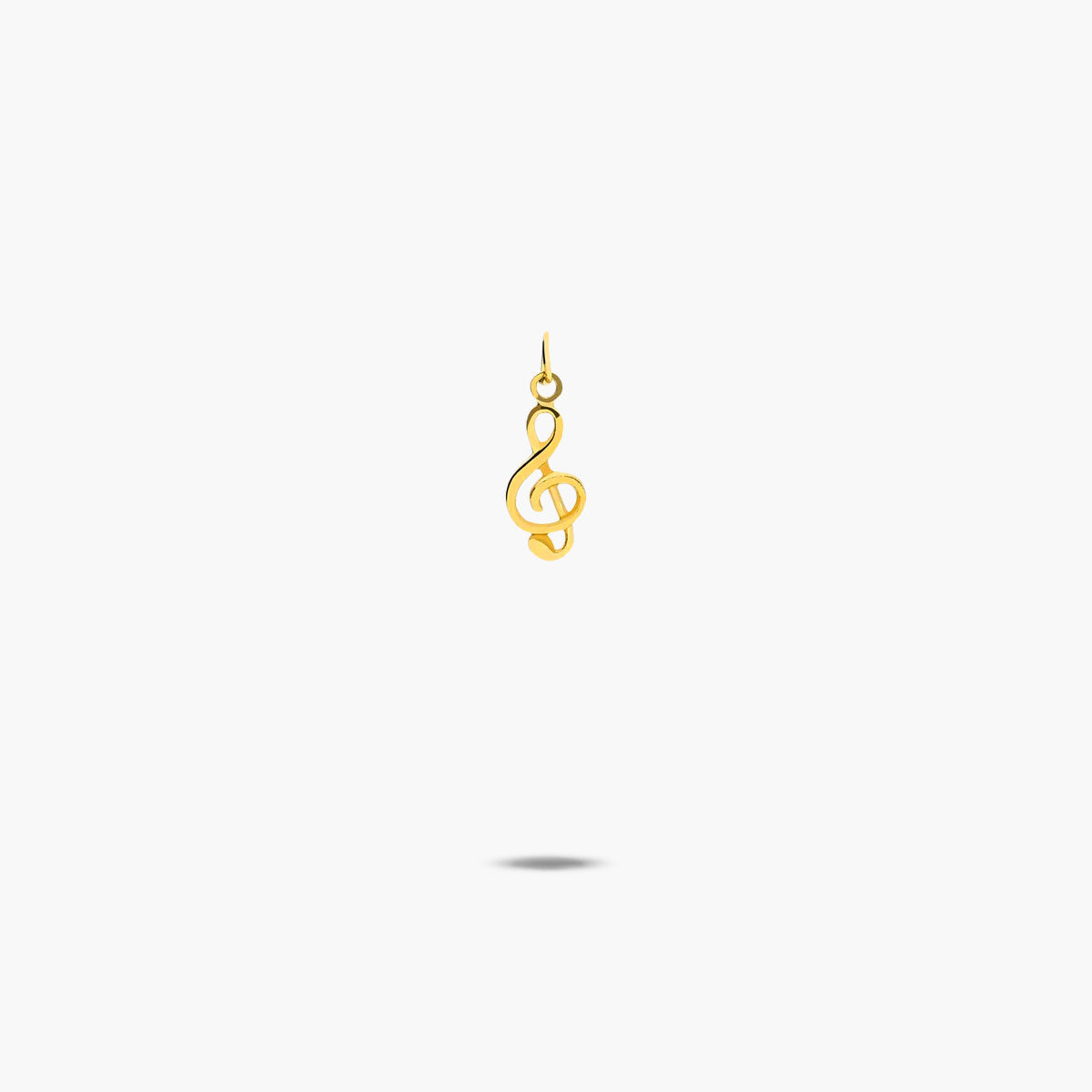 Colgante clave de sol oro 18 quilates