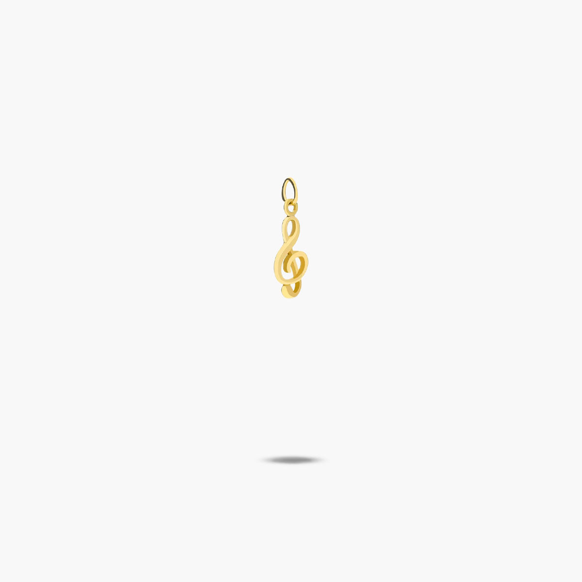 Colgante clave de sol oro 18 quilates