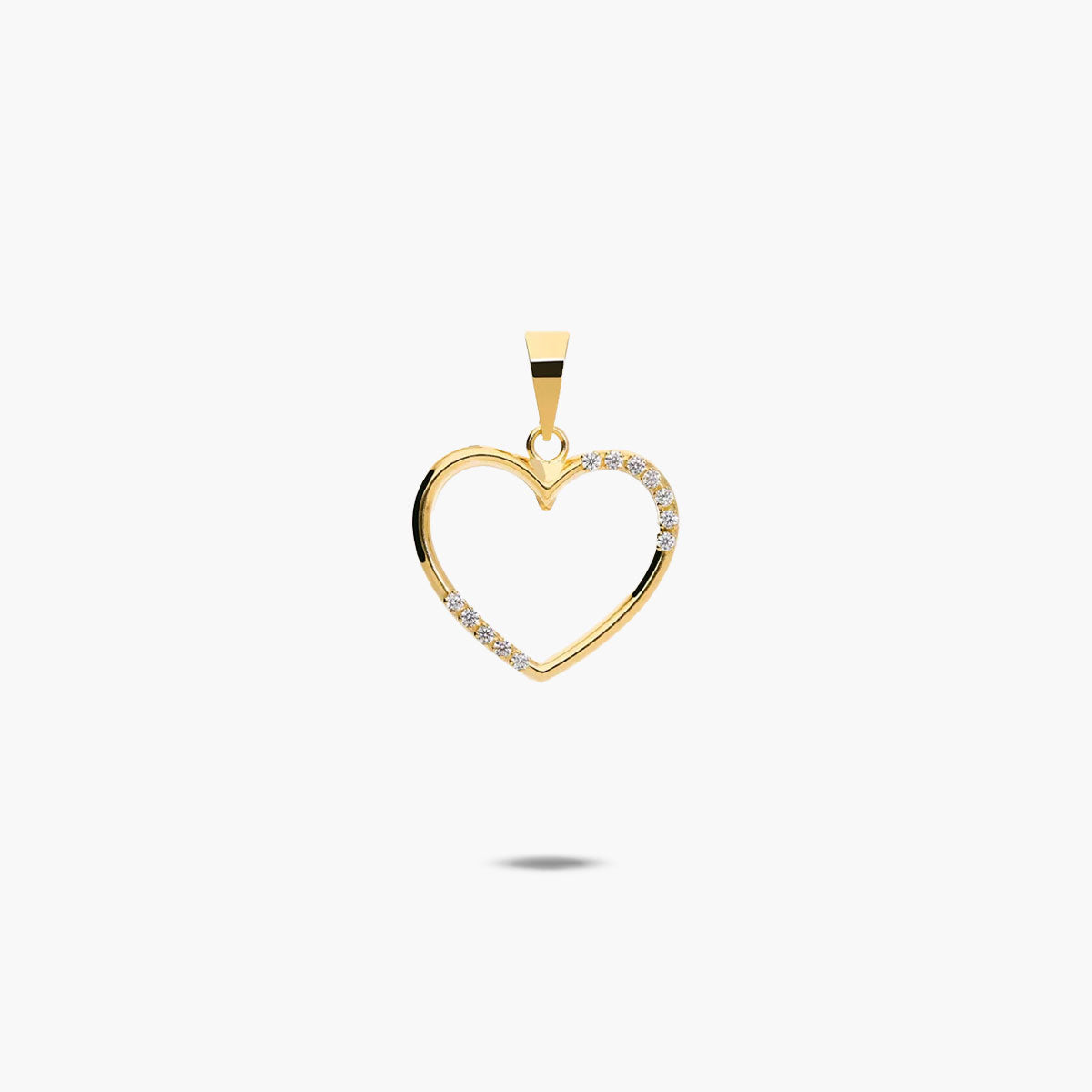 Colgante silueta corazón de oro 18K circonita 15 mm