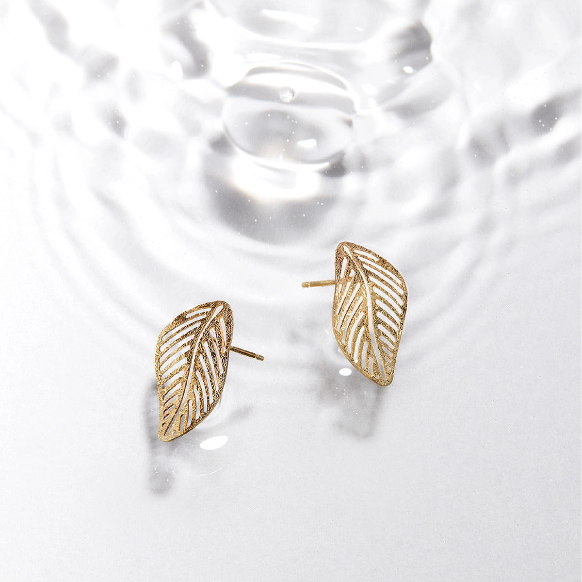 Pendientes forma de hoja de oro 18K 20 mm