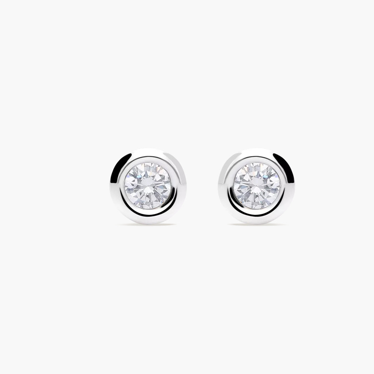 Pendientes redondos de oro blanco 18K circonitas 7 mm