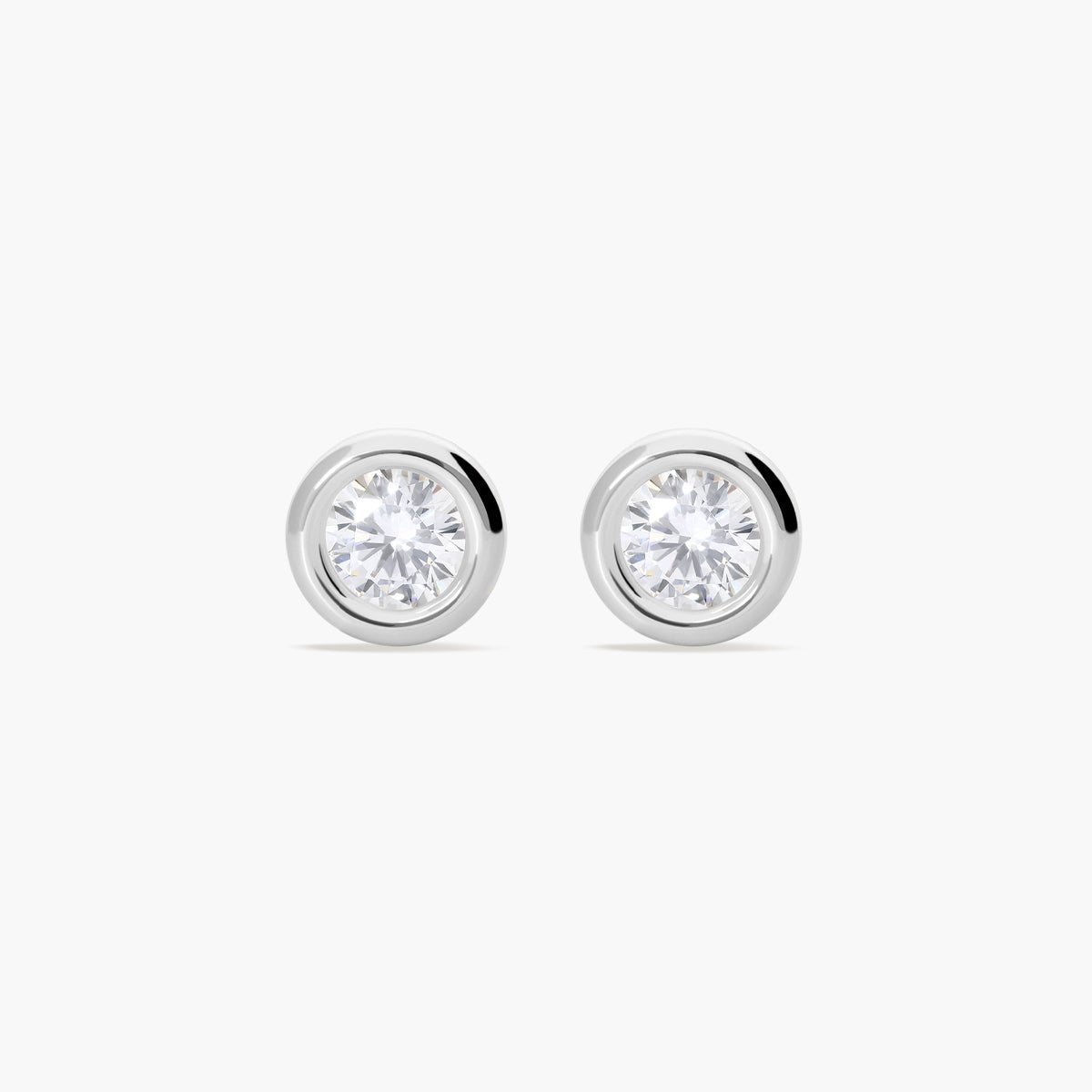 Pendientes redondos de oro blanco 18K circonitas 9 mm