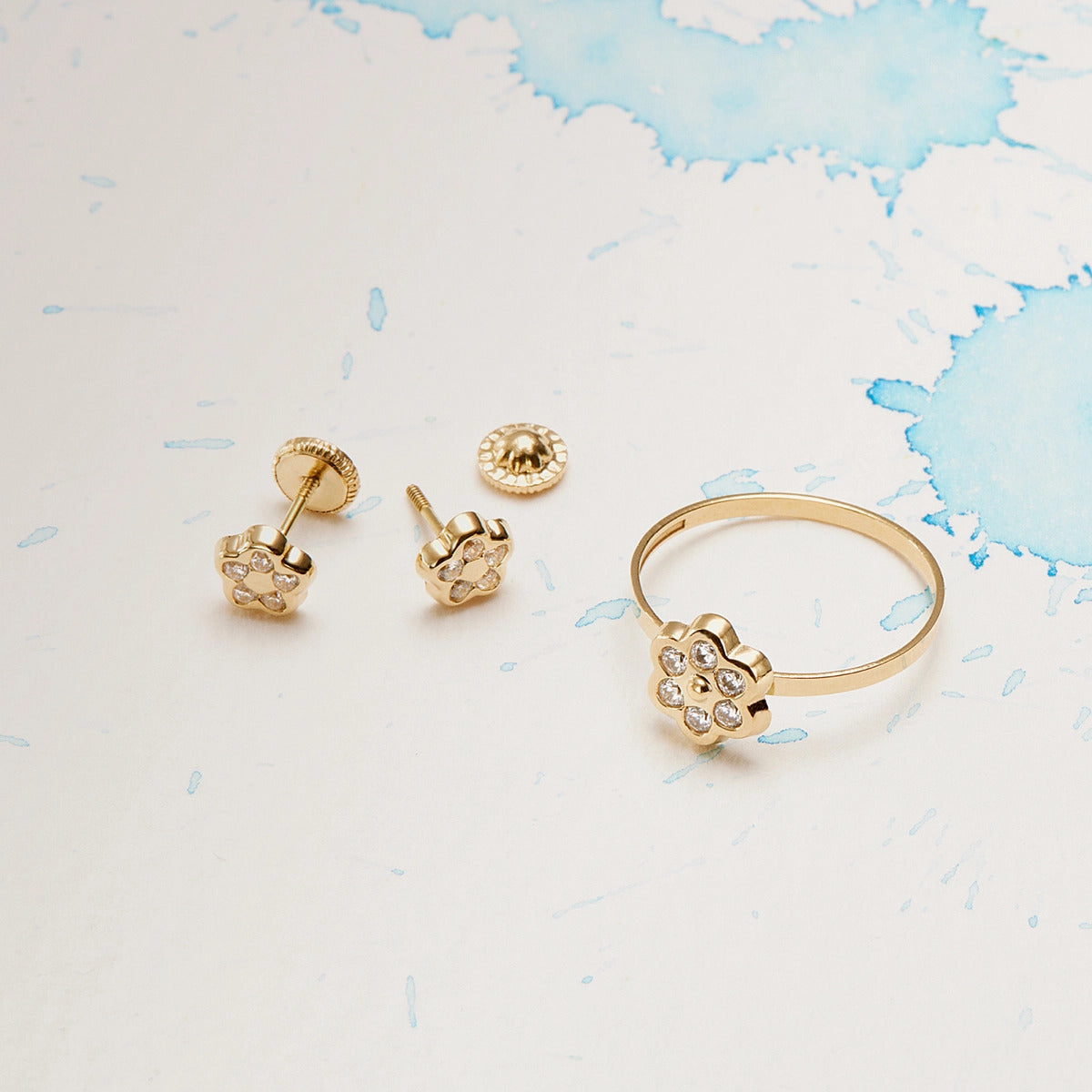 Pendientes margarita de oro 18K circonitas para bebé 5 mm