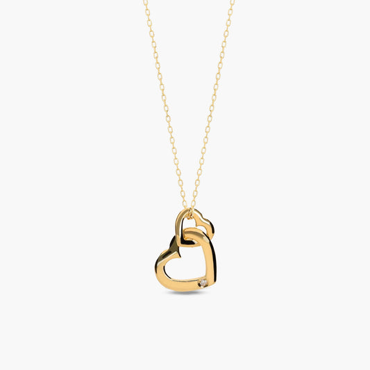 Collar silueta corazones de oro 18K diamante natural 0.01 ct. 14 mm