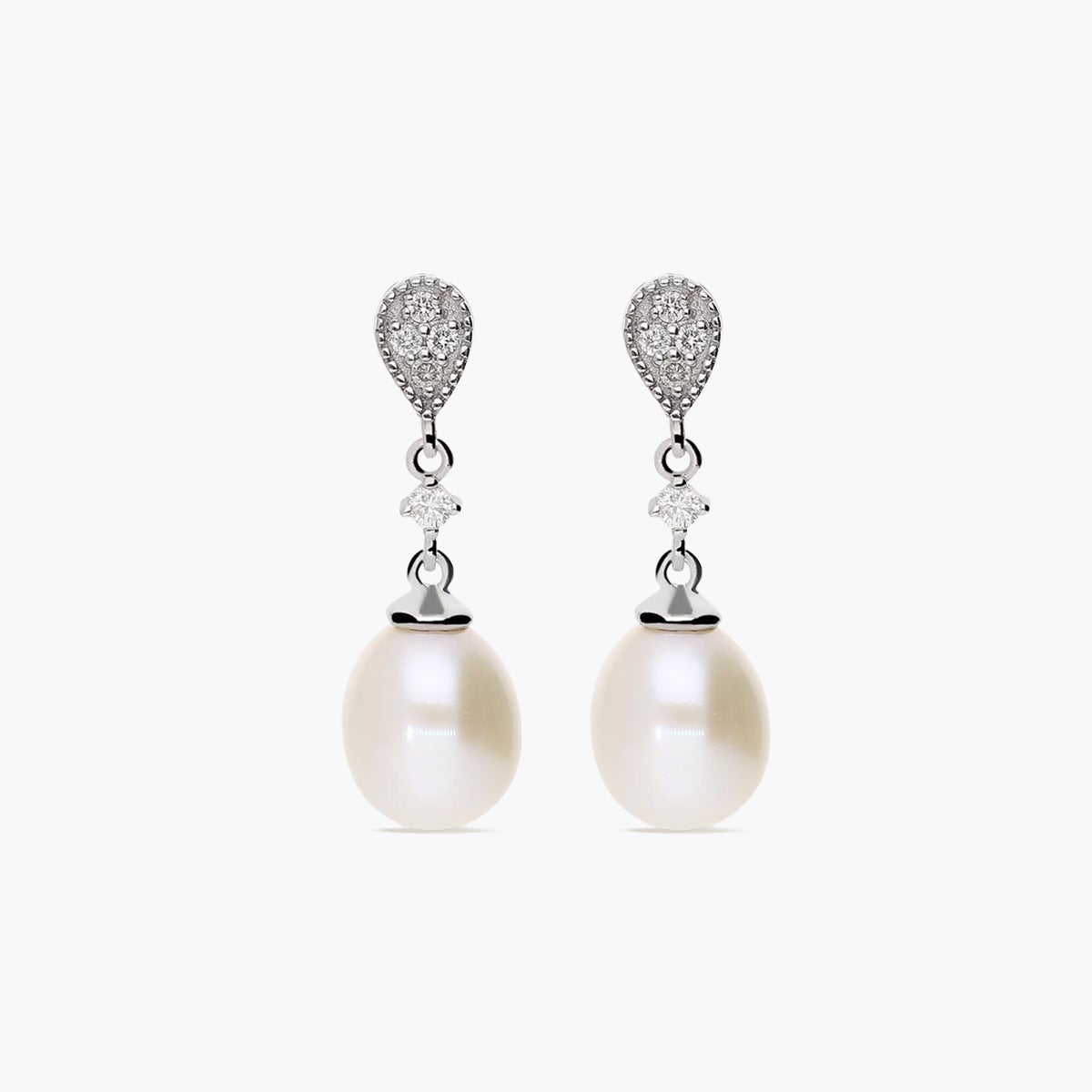 Pendientes largos de oro blanco 18K diamante natural 0.11 ct. con perlas 21 mm TREASURE