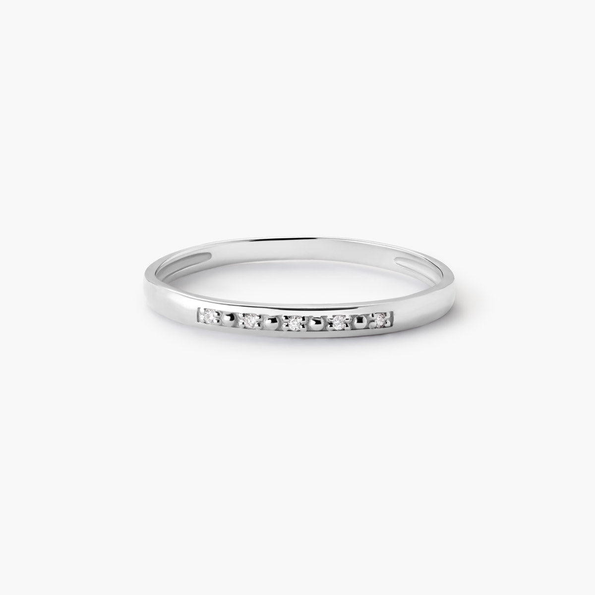 Anillo de oro blanco 18K diamante natural 0.025 ct.