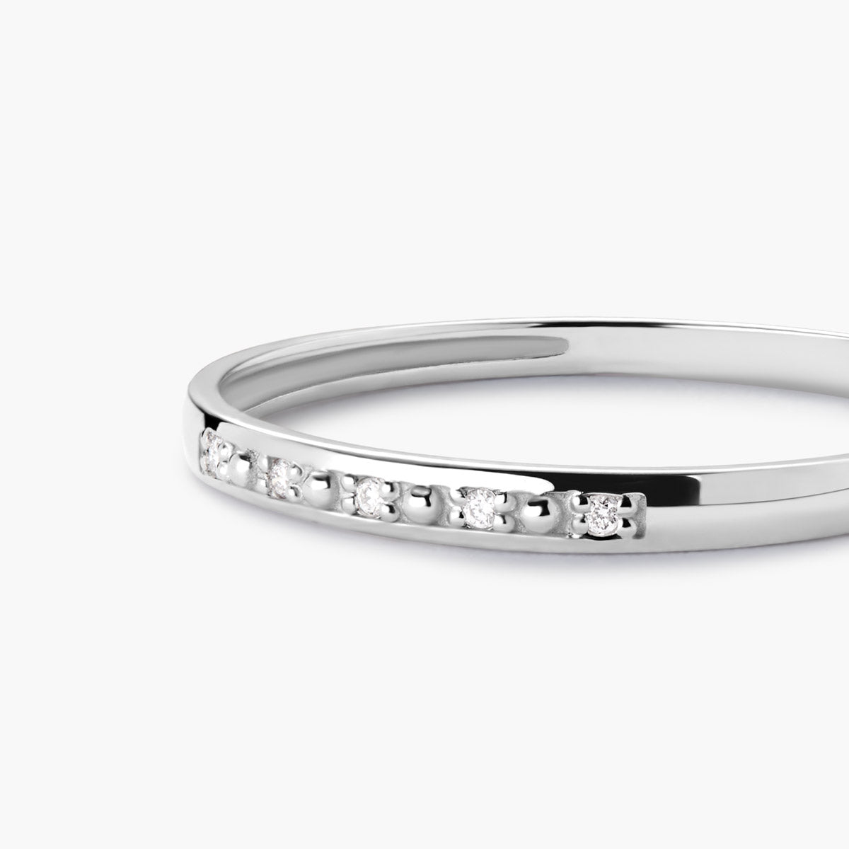 Anillo de oro blanco 18K diamante natural 0.025 ct.