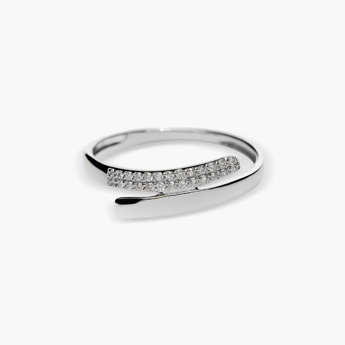 Anillo de oro blanco 18K diamante natural 0.1 ct.