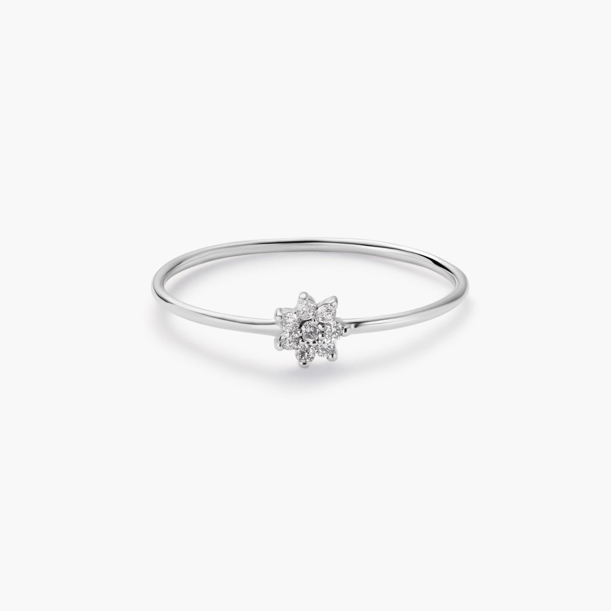 Anillo de oro blanco 18K diamante natural 0.08 ct.