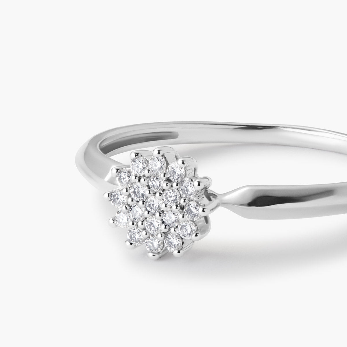 Anillo de oro blanco 18K diamante natural 0.1 ct. 