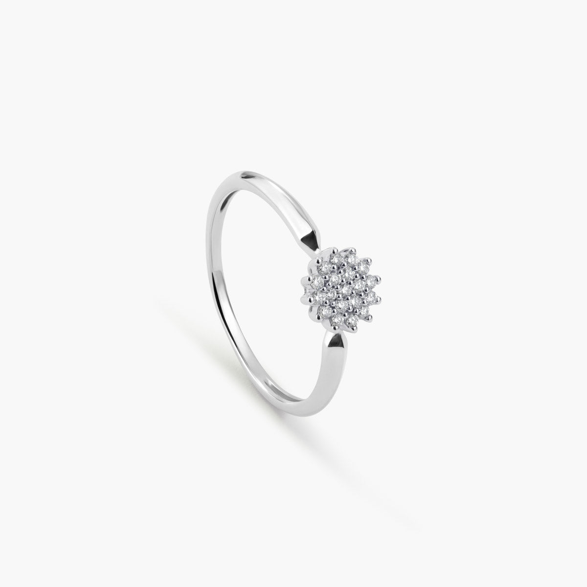 Anillo de oro blanco 18K diamante natural 0.1 ct. 
