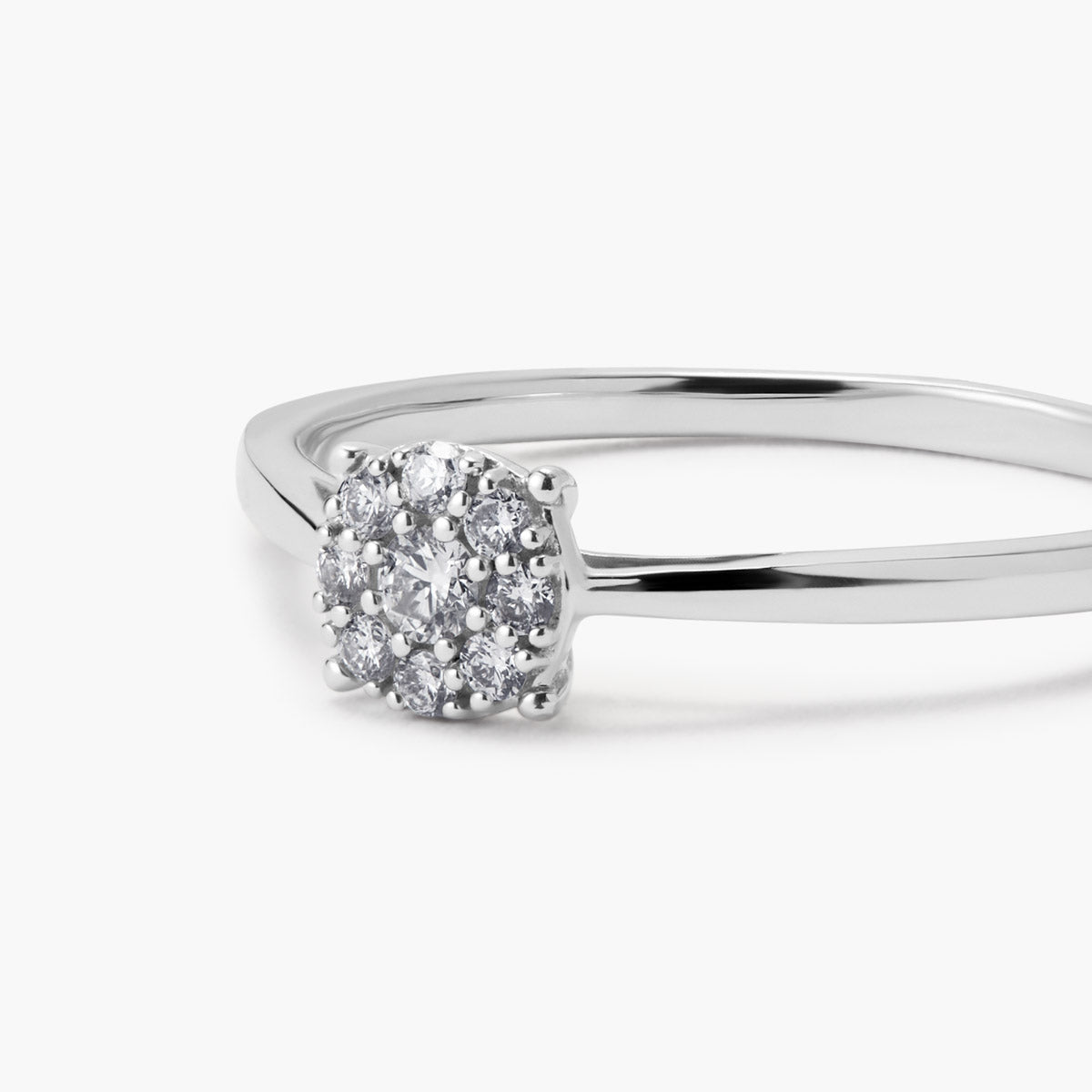 Anillo de oro blanco 18K diamante natural 0.12 ct.