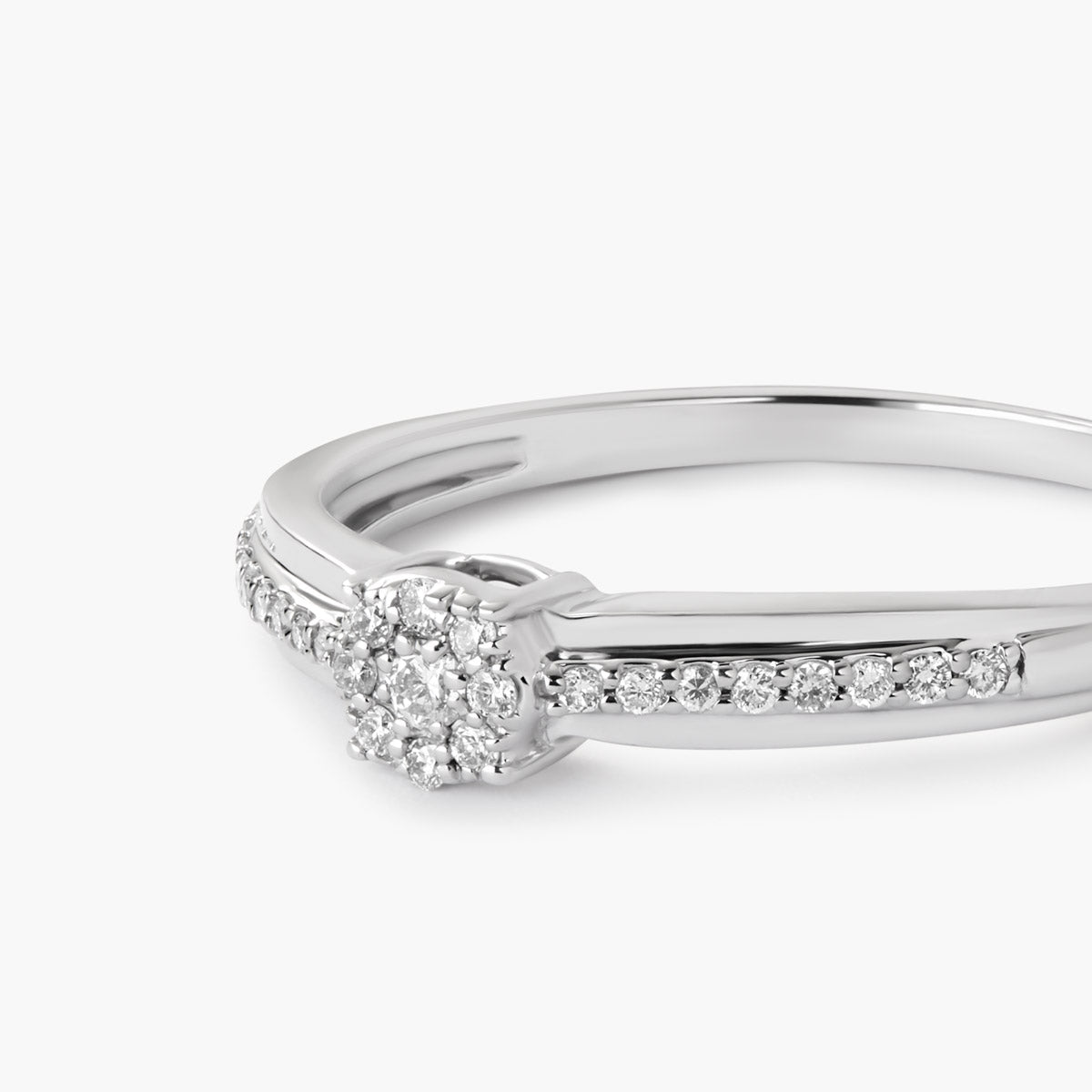 Anillo de oro blanco 18K diamante natural 0.12 ct.