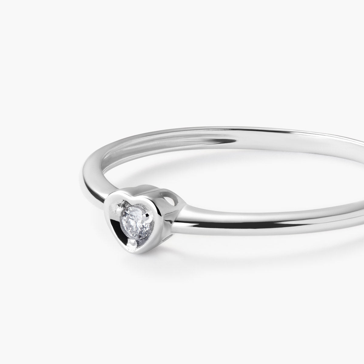Anillo de oro blanco 18K diamante natural 0.03 ct.