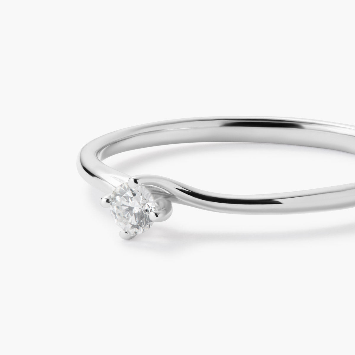 Anillo de oro blanco 18K diamante natural 0.1 ct. SWIRL