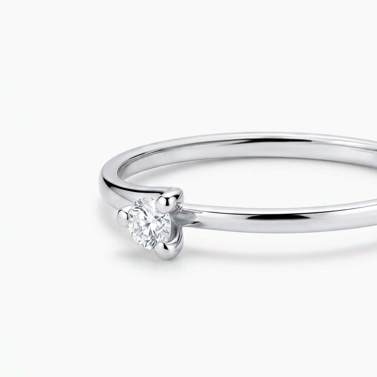 Anillo de oro blanco 18K diamante natural 0.1 ct. SWIRL