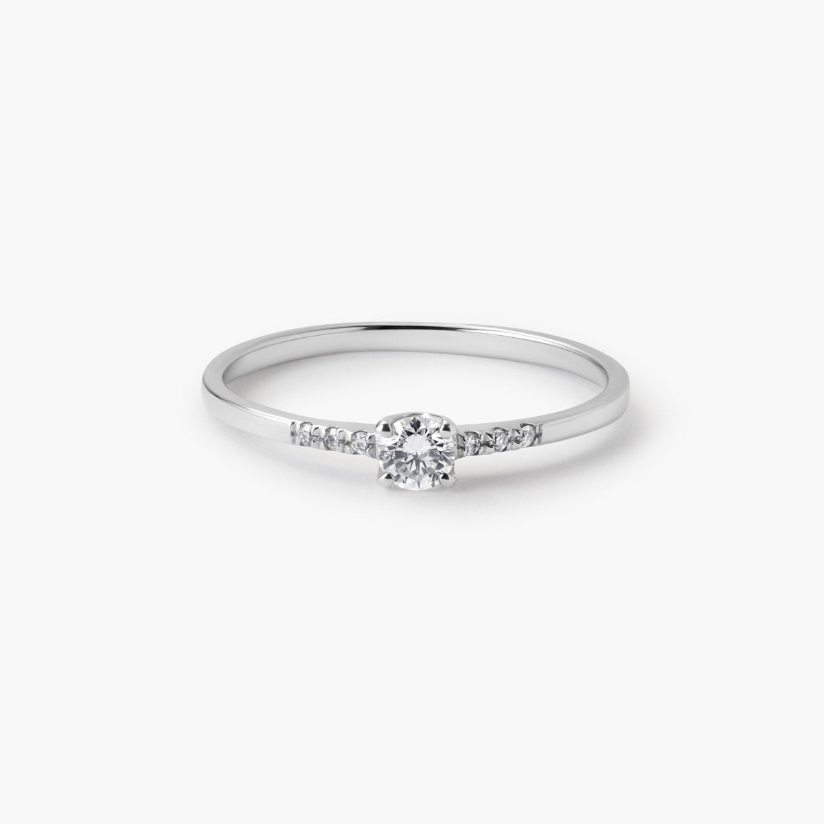 Anillo de oro blanco 18K diamante natural 0.18 ct. COMET