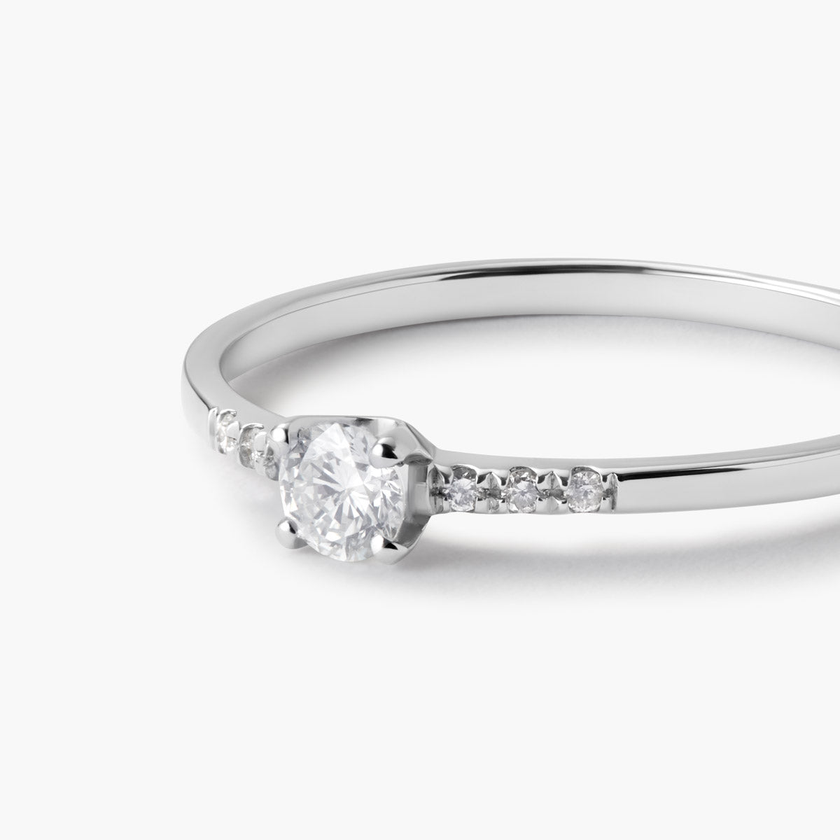 Anillo de oro blanco 18K diamante natural 0.18 ct. COMET