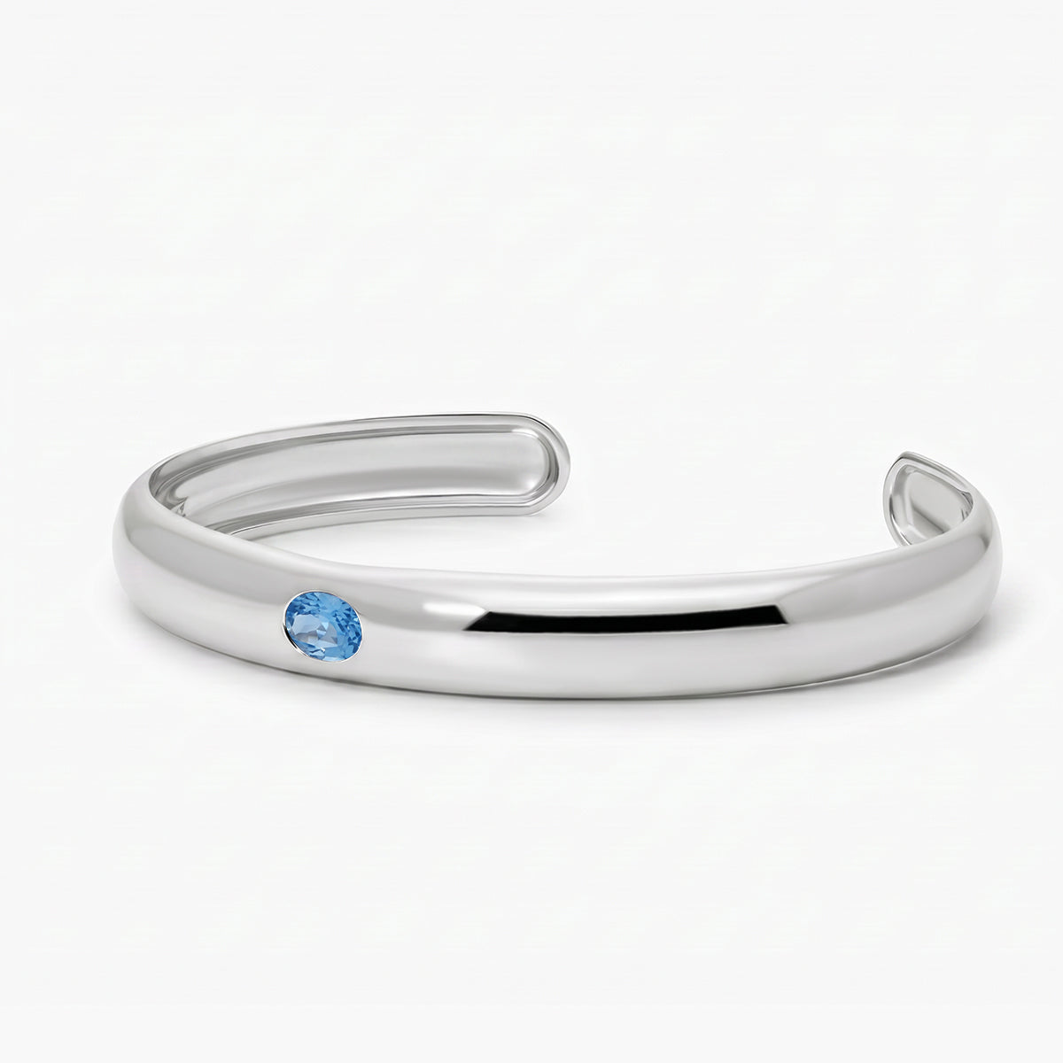 Pulsera rígida de plata 1ª ley topacio azul 45x60 mm MONOLITH
