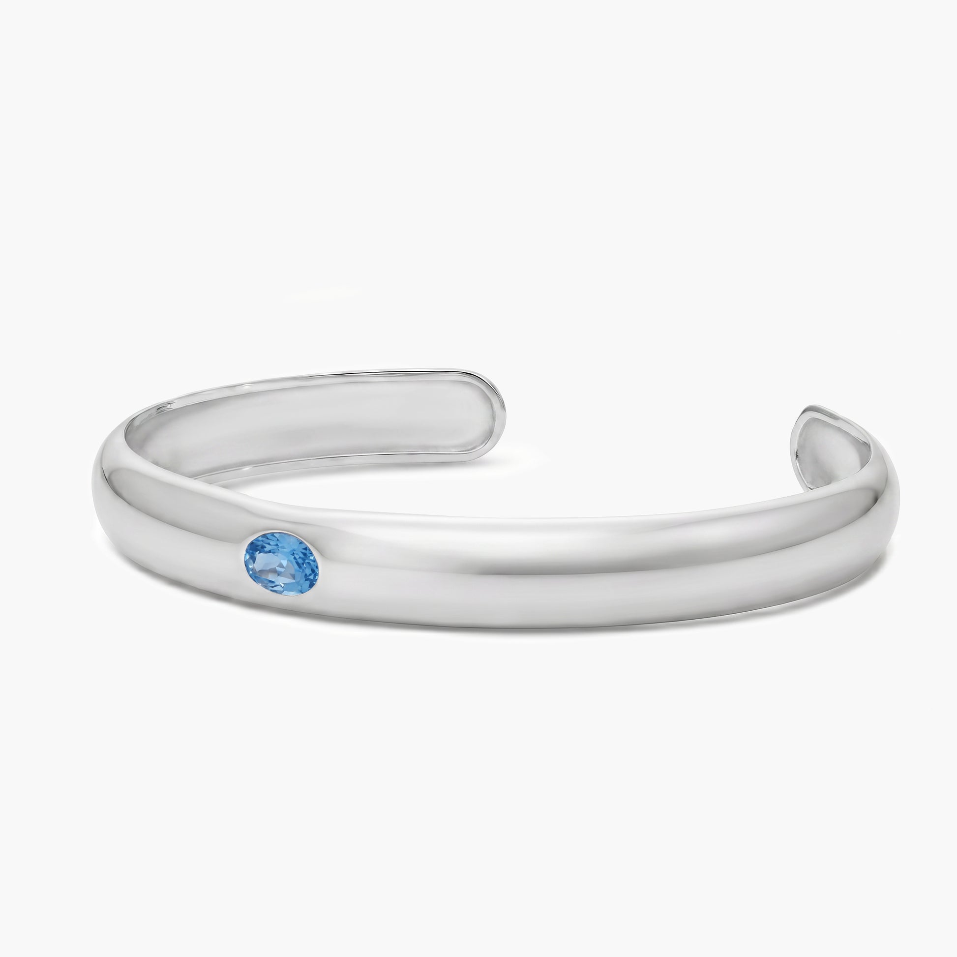Pulsera rígida de plata 1ª ley topacio azul 45x60 mm MONOLITH