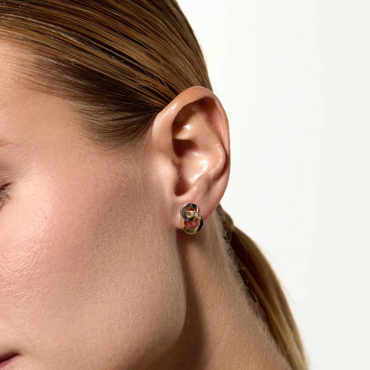 Pendientes doble círculo de oro bicolor 18K circonitas 13 mm